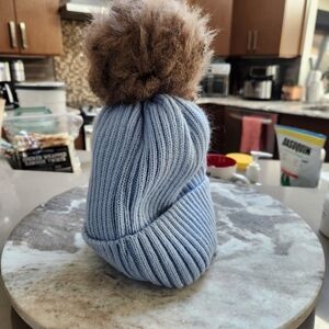 Hat with pom pom